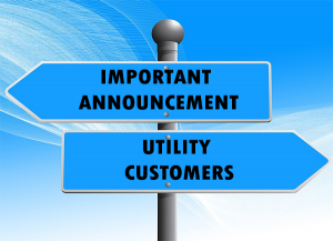 Directional Signs that state Important Announcement and Utility Customers