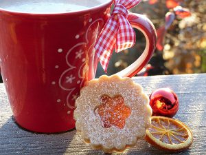 Red tea cup with cookie