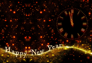 Clock and happy new years in gold on a black background.