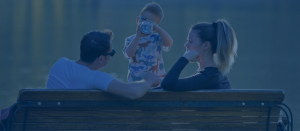 Woman, man, child at the park
