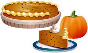 Pumpkin Pie with a slice out on a plate. Pumpkin for decoration.